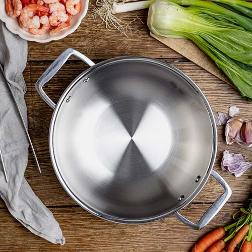 Wok Inox Castel'Pro anses fixes - CRISTEL design et service à table compatible four