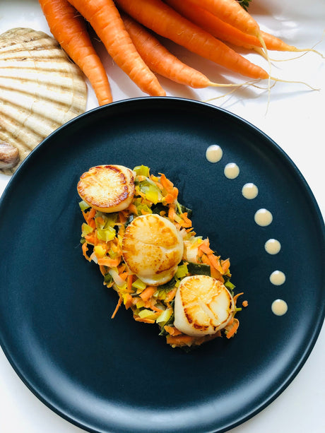 Coquilles Saint-Jacques sur son lit de légumes