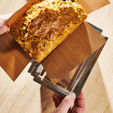 Moule à cake perforé fond amovible 15 cm + 2 feuilles cuisson - DE BUYER inox