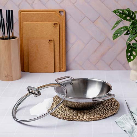 Wok Inox Castel'Pro anses fixes et couvercle inclus - CRISTEL service maintient au chaud faire mijoter